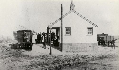 Edward Heron-Allen dismounting from the Selsey Tram